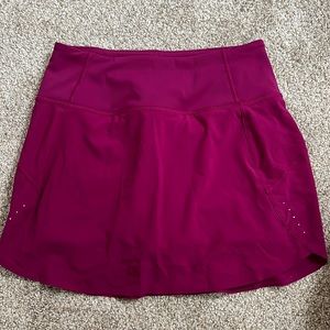 Never worn- Athleta Run with it 14” Skort